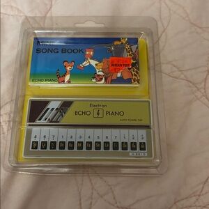 Vintage NEW Electron Echo Mini Piano Toy mini song book